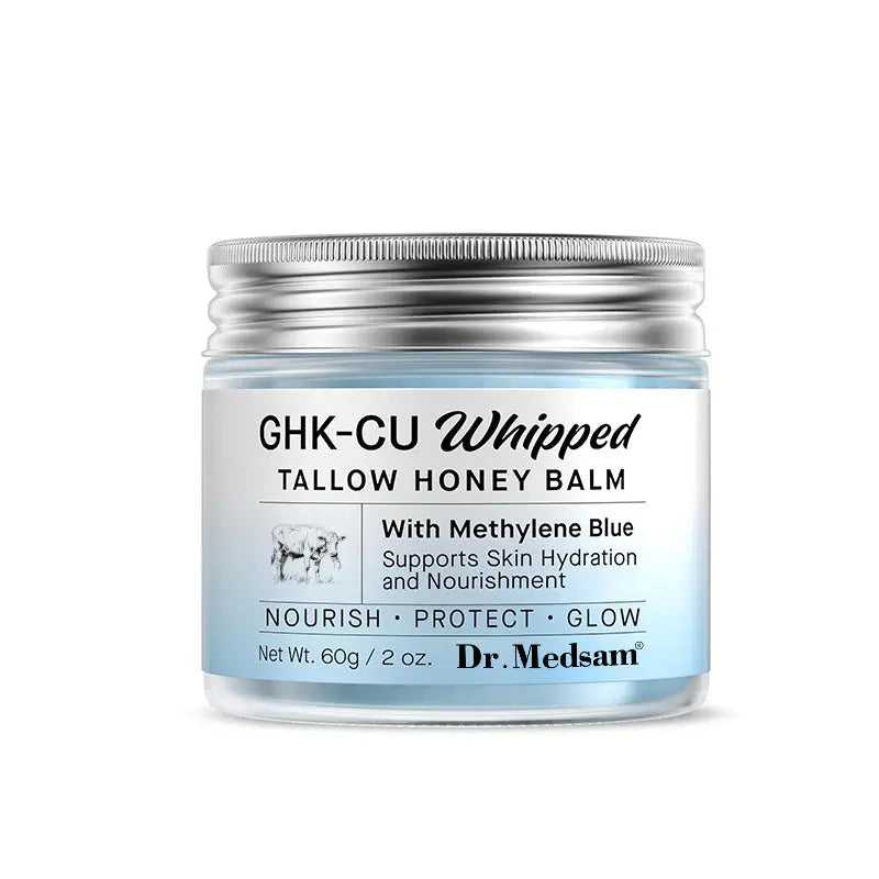 Silver jar of GHK-Cu Whipped Tallow Honey Balm with blue label, containing copper peptide skincare for dry skin, 60g