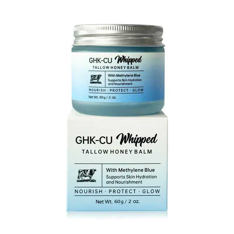 Blue jar of GHK-Cu Whipped Tallow Honey Balm with silver lid, supporting skin hydration and nourishment, 60g size