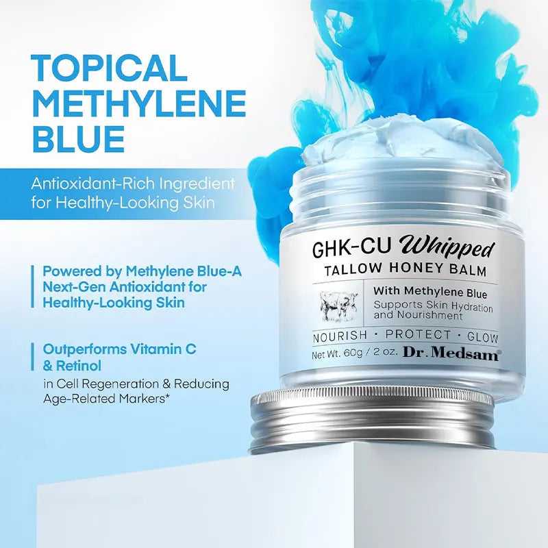 GHK-Cu Whipped Tallow Honey Balm jar with blue Methylene Blue ink swirling in background, promoting antioxidant-rich skincare for healthy-looking skin
